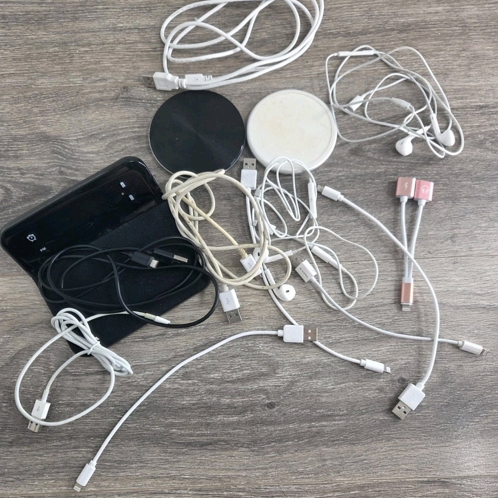 Assorted White and Black Mobile Charging Cables with Pink Accents